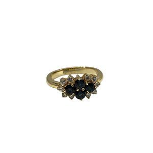 14 k Gold with white round diamonds Blue Sapphire